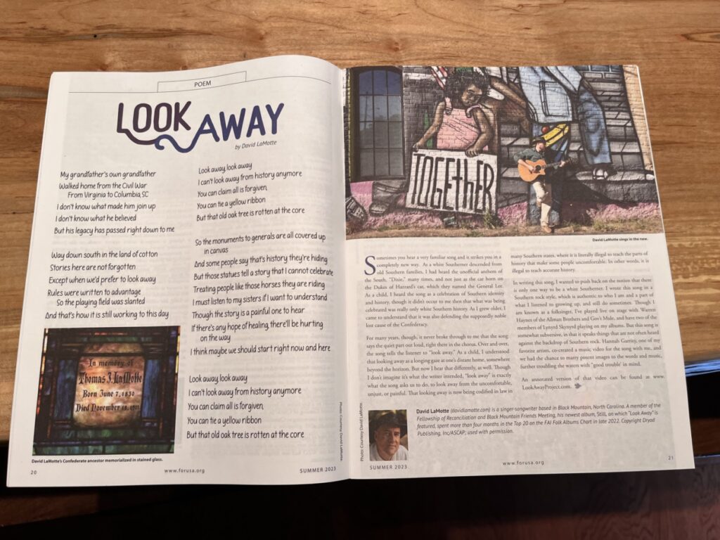 open magazine showing the title words "Look Away" above a song lyric, article, and two photos.